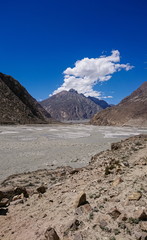 Trekking along the Braldu River in the Karakorum Mountains in Northern Pakistan, Landscape of K2 trekking trail in Karakoram range, Pakistan