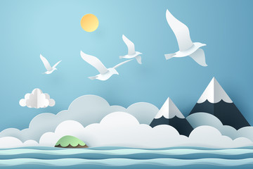 Fototapeta na wymiar Paper art seagull fly above the sea