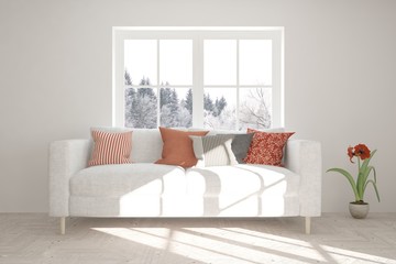 White room with sofa and winter landscape in window. Scandinavian interior design. 3D illustration