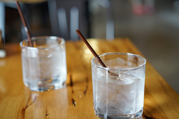 drinking water In the glass on the table