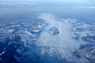 Sea of clouds from a plane in the Alps