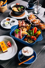 Seafood mixed grilled such as fish, squid, prawns, mussels and vegetables served with sweet and sour sauces.