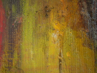 Thick layers of paint on a wooden board