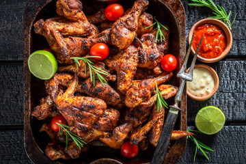 Spicy roasted chicken wings with rosemary and spices