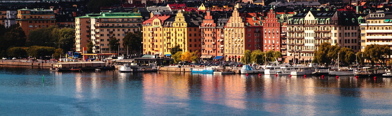 Colored facades of the houses next to the embankment in the Stockholm