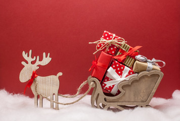 christmas deer with sledges and presents festive mood