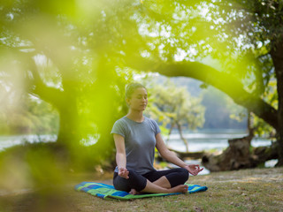 woman meditating and doing yoga exercise