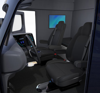Autonomous truck interior with black seats and wall mounted monitor, full size bed. 3D rendering image.