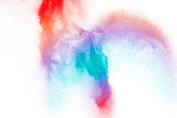 Abstract colorful dust particles textured background.Multicolored particles explosion on white...