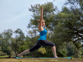 Fototapeta na wymiar woman meditating and doing yoga exercise