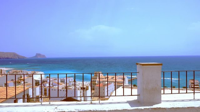 Teal and orange look of typical white houses and the mediterranean sea of the Costa Blanca from Altea, Alicante, Spain