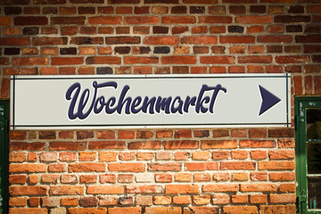 Fototapeta na wymiar Schild 318 - Wochenmarkt