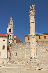 Fototapeta na wymiar Croatia, Zadar - Roman column near the Serbian church of Saint. Elijah.