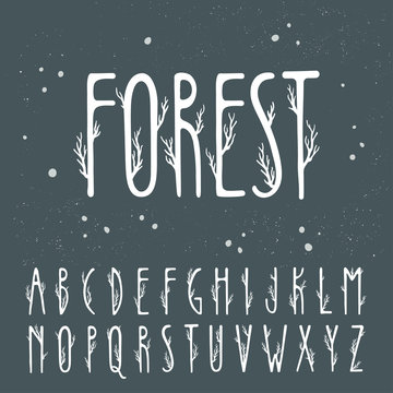 Autumn vector alphabet. Uppercase letters decorated with tree branches.