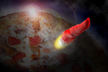 concept of fast delivery. Red pepper as a rocket starts from the planet Pizza.
