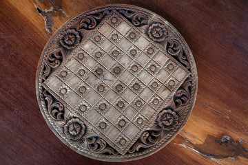 Wooden chess board on a wooden table