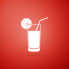 Glass of juice icon isolated on red background. Orange slice and tube for drinking. Healthy organic food. Flat design. Vector Illustration