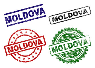 MOLDOVA seal prints with damaged surface. Black, green,red,blue vector rubber prints of MOLDOVA label with dust surface. Rubber seals with circle, rectangle, rosette shapes.