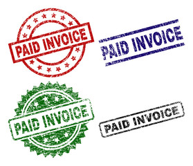 PAID INVOICE seal imprints with distress surface. Black, green,red,blue vector rubber prints of PAID INVOICE text with scratched surface. Rubber seals with round, rectangle, medal shapes.