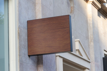 Store brand sign mockup on marble wall