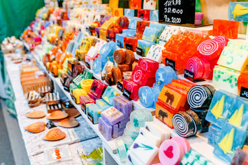 Colorful organic handmade soap for sale at street market fair