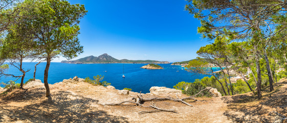 Panoramic view of coast in Sant Elm with natural landmarks Sa Dragonera and Es Pantaleu islands