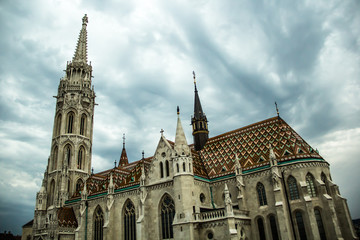 Fototapeta na wymiar Saint Matthias Church at Budapest in a cloudy day