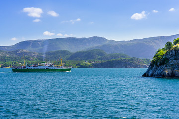 Boat sailing in the fjord