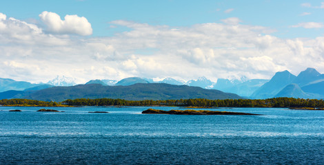 Sunny morning near the ferry moorage in norwegian village. North sea view, Norway, Europe