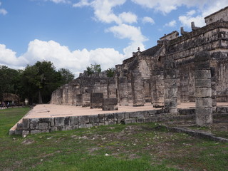 Fototapeta na wymiar Fantastic side of famous platform of Temple of Warriors at Chichen Itza city in Mexico on February