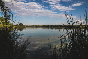 nice views of the lake with clouds drawing the sky