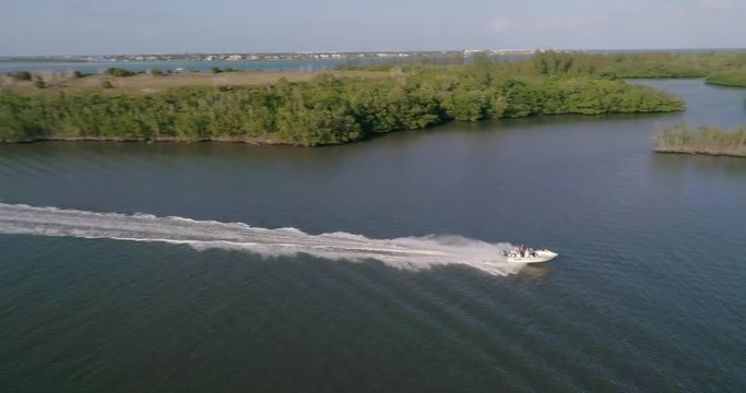 Aerial View Following a Speed Boat on St Lucie River
