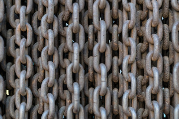 Rows of old rusty metal chains as a background