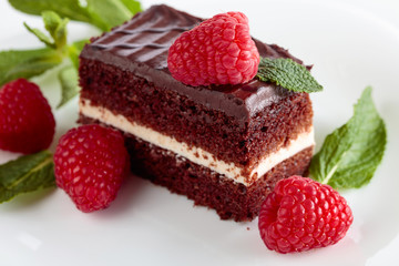 Chocolate cake with raspberry and mint.