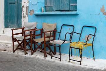 old  chairs in the street in Greece