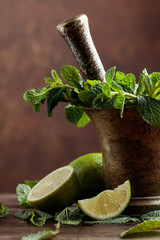 Bunch of fresh green organic mint and lime.
