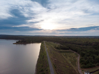 Drone shot Aerial view landscape scenic of big river reservoir dam with nature forest and mountains in tropical land