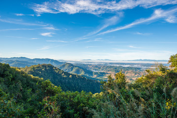Mountains and tree with beautiful blue sky and cloud in the morning