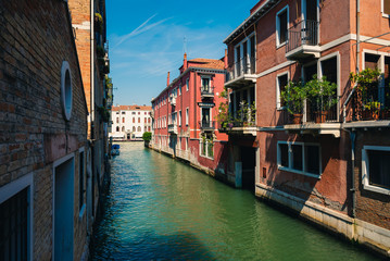Traditional canal street with in Venice, Italy.