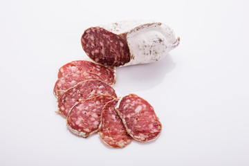 Saucisson sec delicious french salami on a white background