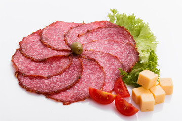 delicious sliced salami on a white background