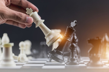 White king in chess game with Concept for company strategy,business victory or decision the path to...