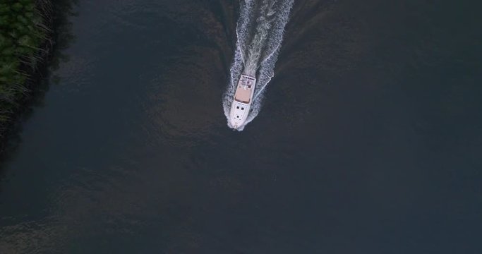 Top Down Aerial View of a Speed Boat Sailing 