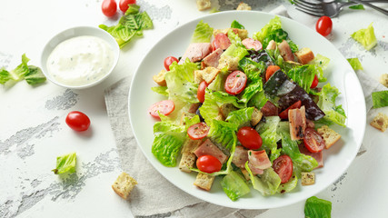 Bacon Lettuce Tomato, BLT salad with creamy dressing sauce, croutons