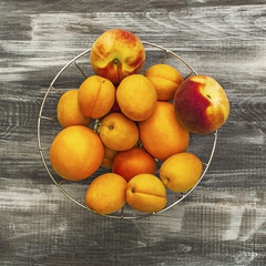Fruits on a wooden background. Fresh fruit after harvest. Fruit for the production of juice, cocktail. Healthy lifestyle.
