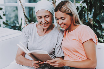 Woman with Mother. Cancer. Remission. Clinic.