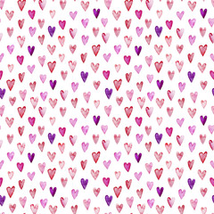 Seamless pattern with pink watercolor hearts.