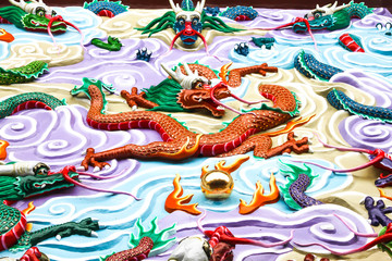 Obraz premium Dragon walls sculptures and decorate in wenwu temple