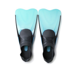 Pair of blue flippers on white background, top view