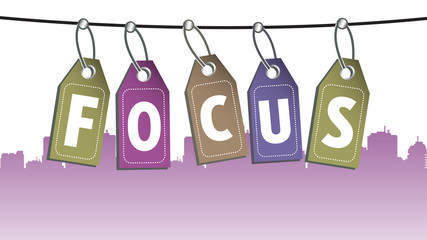 Colorful background with five tags forming the word focus. Focusing concept